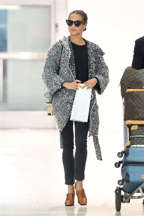 Alicia Vikander Steps Up Her Airport Style in the .